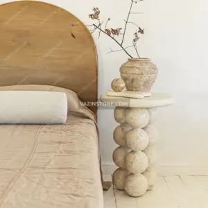 Orbita stone side table as a bedside table