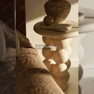 Orbita side table in a bedroom