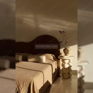 Orbita side table in a bedroom