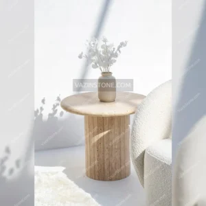 Rina stone side table with decorative items