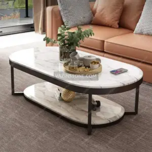 Claris stone coffee table with decorative items