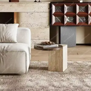 Reverse stone side table next to a sofa