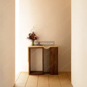 Sivan stone side table with a flower pot
