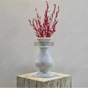 Marbelino stone flower pot with flowers