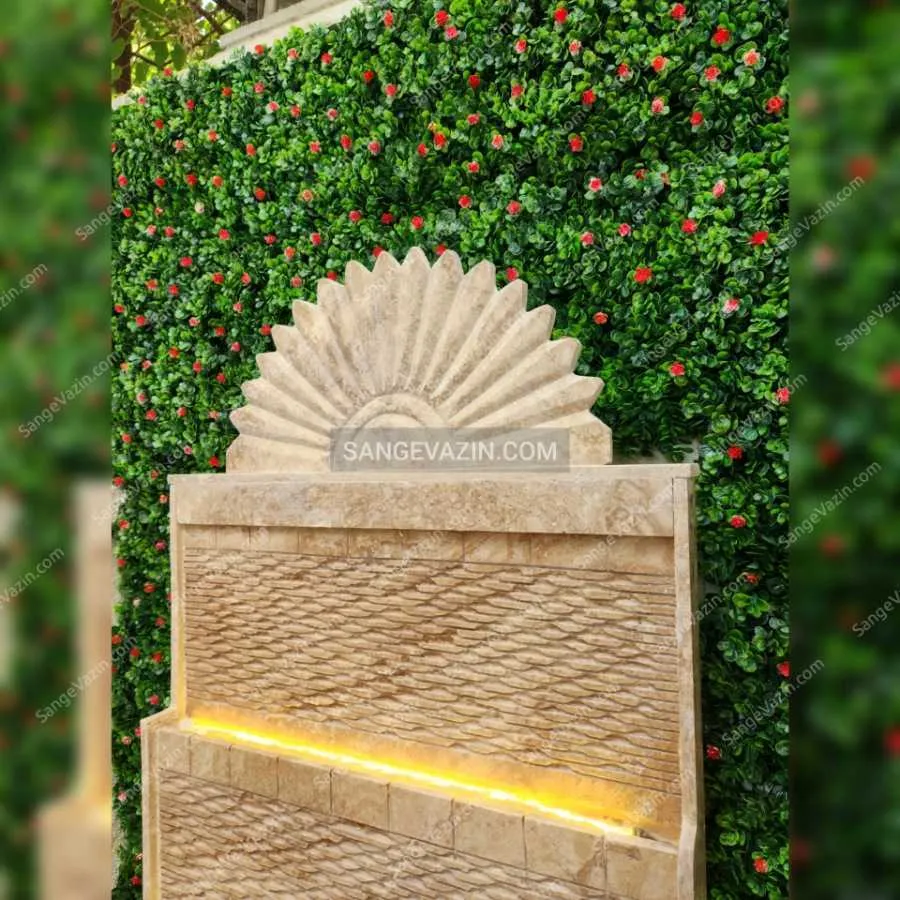 Stone fountain with green wall