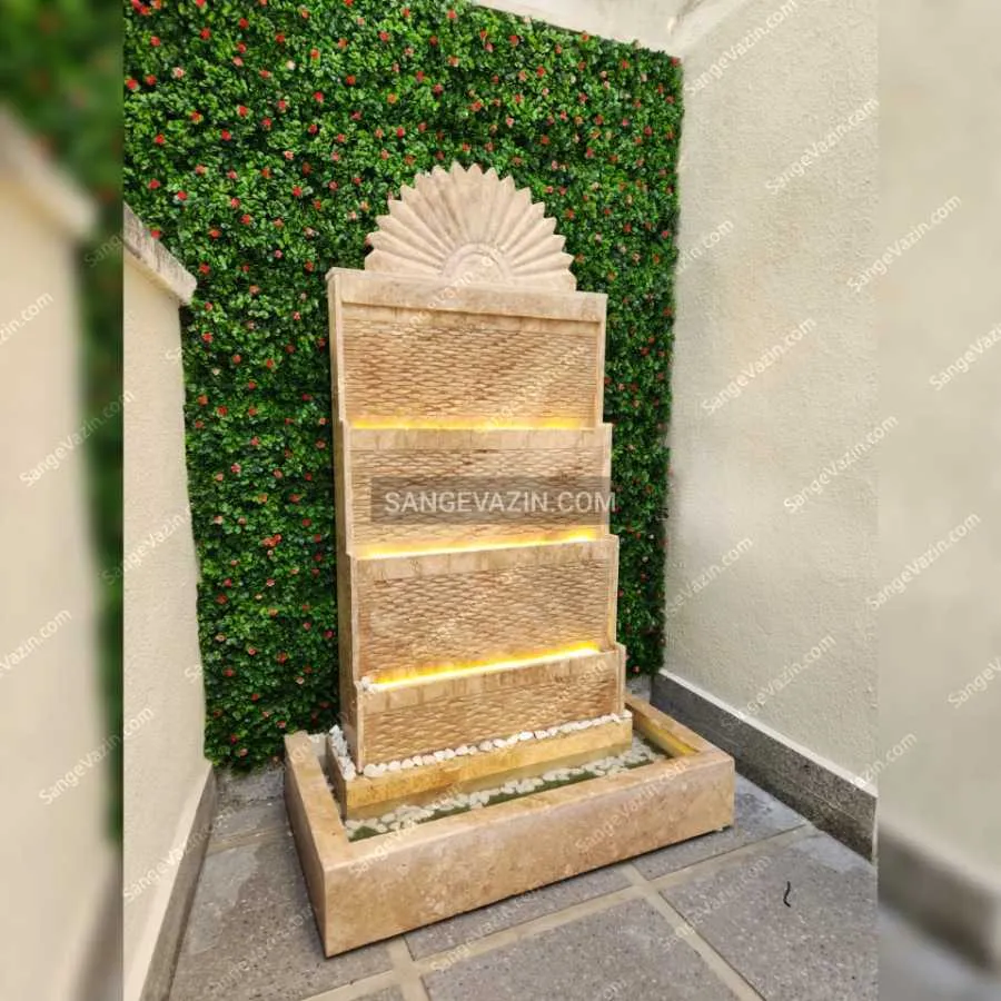 Stone fountain with green wall