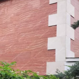 Red travertine stone on facade