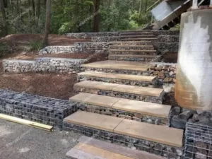 Outdoor staircase with gabion and pebble