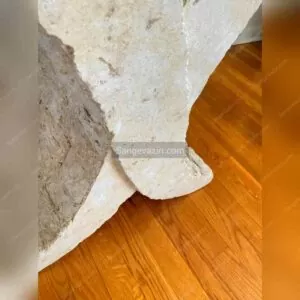 X shaped stone table closeup