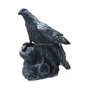 Eagle and snake stone sculpture
