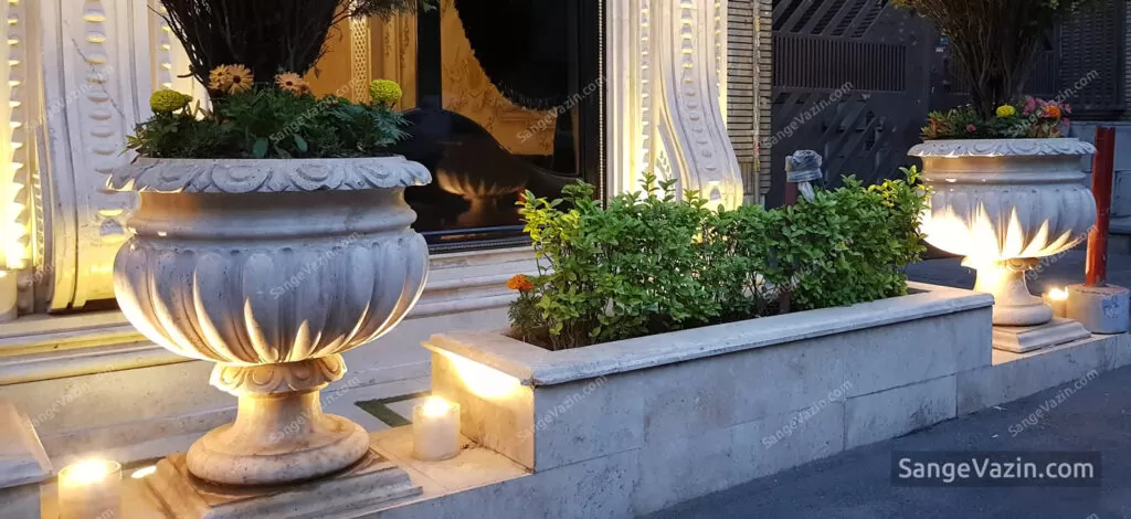 Outdoor stone flower pot at night